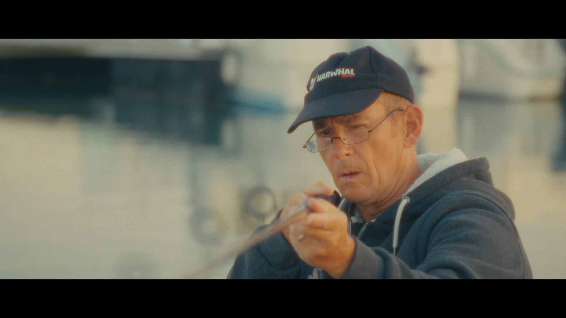 a man holding a metal rod